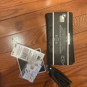 NWT Black Wristlet with Tassel